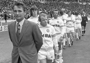 If looks could kill! Clough leads out the Leeds team during his controversial 44 days in 1974. 