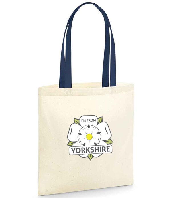 natrual tote bag with navy straps and the i'm from yorkshire logo on the front centre